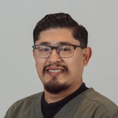 A headshot photo of Alan