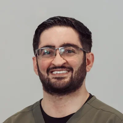 A headshot photo of Faraz